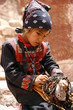 young asian girl selling beads young asian girl selling beads