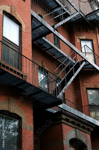 Photo: old fire escape on brick building old fire escape on brick building