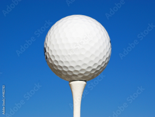 Photo: golf ball on tee golf ball on tee