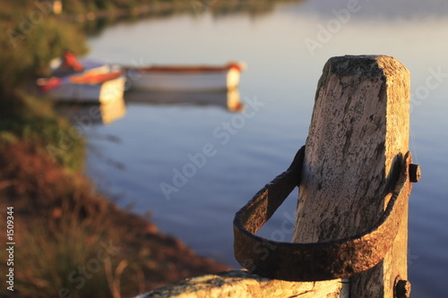 Photo: gatepost with dinghies gatepost with dinghies