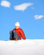girl sitting on snow