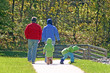 family walking in park family walking in park