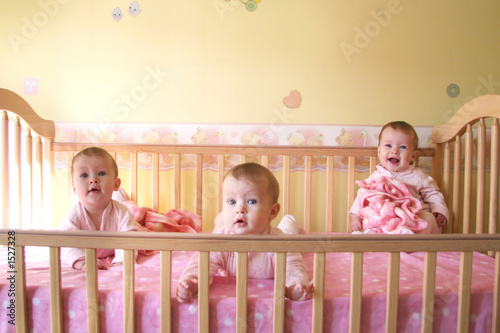 Photo: baby girls in crib - triplets baby girls in crib - triplets