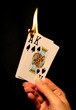 hot card hand (focus at bottom of flame)