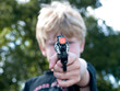 boy and a toy gun boy and a toy gun