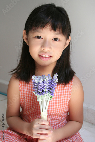 Photo: girl holding lavender girl holding lavender