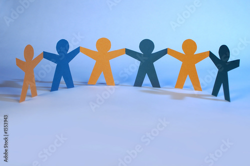 cut-out figures holding hands together