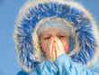 girl trying to warm her face