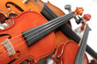three violins. soft focus