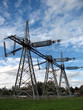 high voltage electricity pylons near the houses