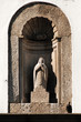 portugal, porto: statue on a wall of a church portugal, porto: statue on a wall of a church