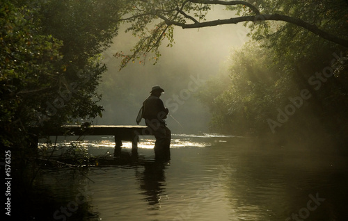 misty river fisherman