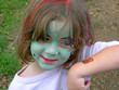 girl with painted face and tatoo girl with painted face and tatoo
