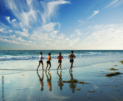 Photo: jogging along the surf jogging along the surf