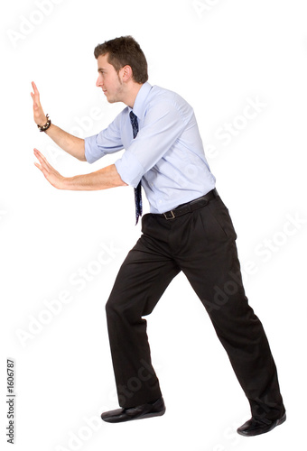 business man pushing something aside