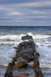 stone breakwater in winter