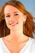 smiling casual girl on blue background smiling casual girl on blue background