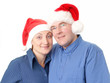 young couple in santa hats