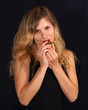 girl eating strawberry
