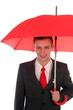 businessman holding an umbrella
