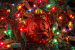 red christmas ball in christmas lights
