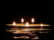 candles and its reflection