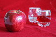 red apple and glasses of wine