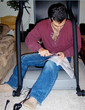 man assembling a treadmill