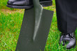 business man digging a hole
