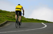 cyclist riding uphill