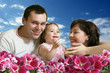 hapyy family and blue skies
