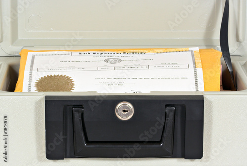 Photo: fire box and birth certificate fire box and birth certificate
