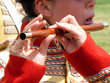 young girl playing flute in a colonial military band