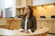 Photo: woman testifying woman testifying