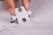 playing jigsaw puzzle