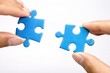 holding jigsaw puzzle