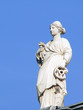 Photo: statue holding gear and hammer statue holding gear and hammer
