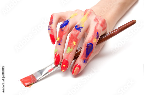 Photo: colored hand with a paintbrush colored hand with a paintbrush