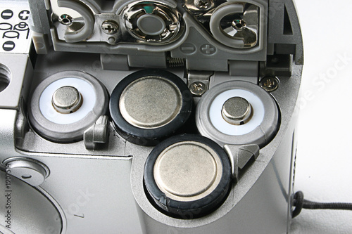 battery slots in a compact camera battery slots in a compact camera