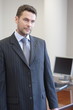 handsome standing mature boss