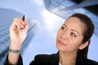 asian business woman writing on screen