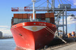container ship being unloaded