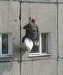 renovation worker on a block of flats