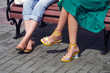 legs having a rest on a bench girlfriends legs having a rest on a bench girlfriends