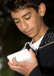 boy using calculator
