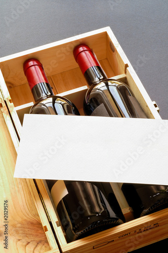 wood gift box with two wine bottles and blank card