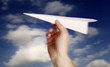 throwing a paper plane..
