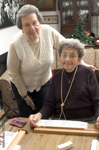 senior woman at the game table senior woman at the game table