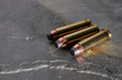 pistol bullets on slate