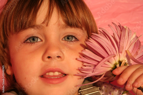 Photo: girl & flower girl & flower